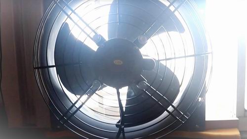 fan in window facing in or out